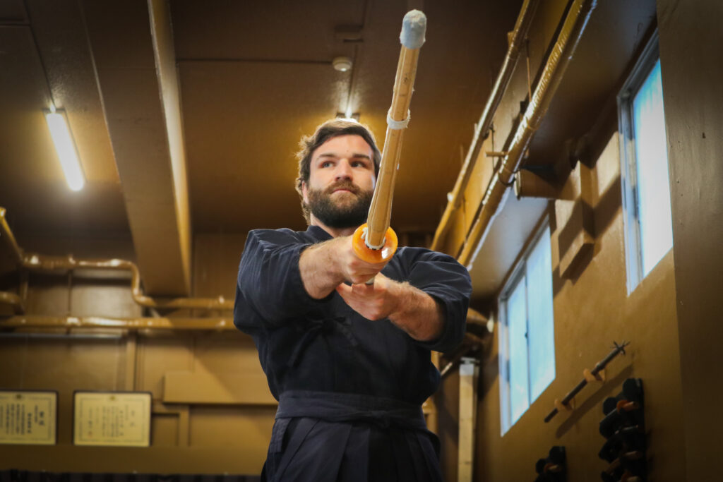 Deep concentration during kendo practice in a traditional Tokyo dojo