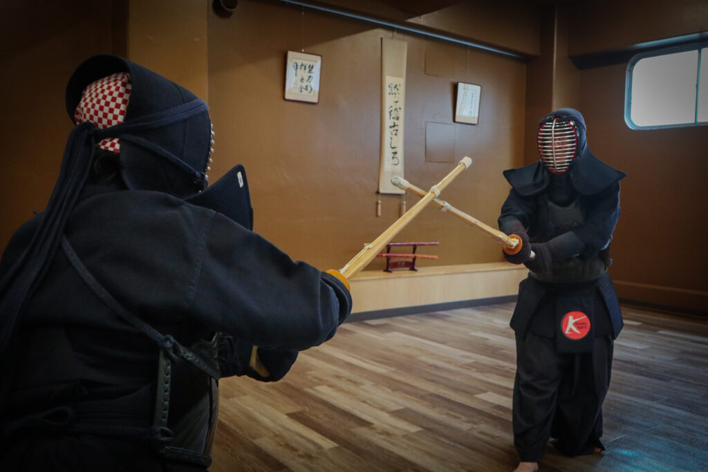 Kendo fight in a Japanese dojo with full bogu armor in Tokyo