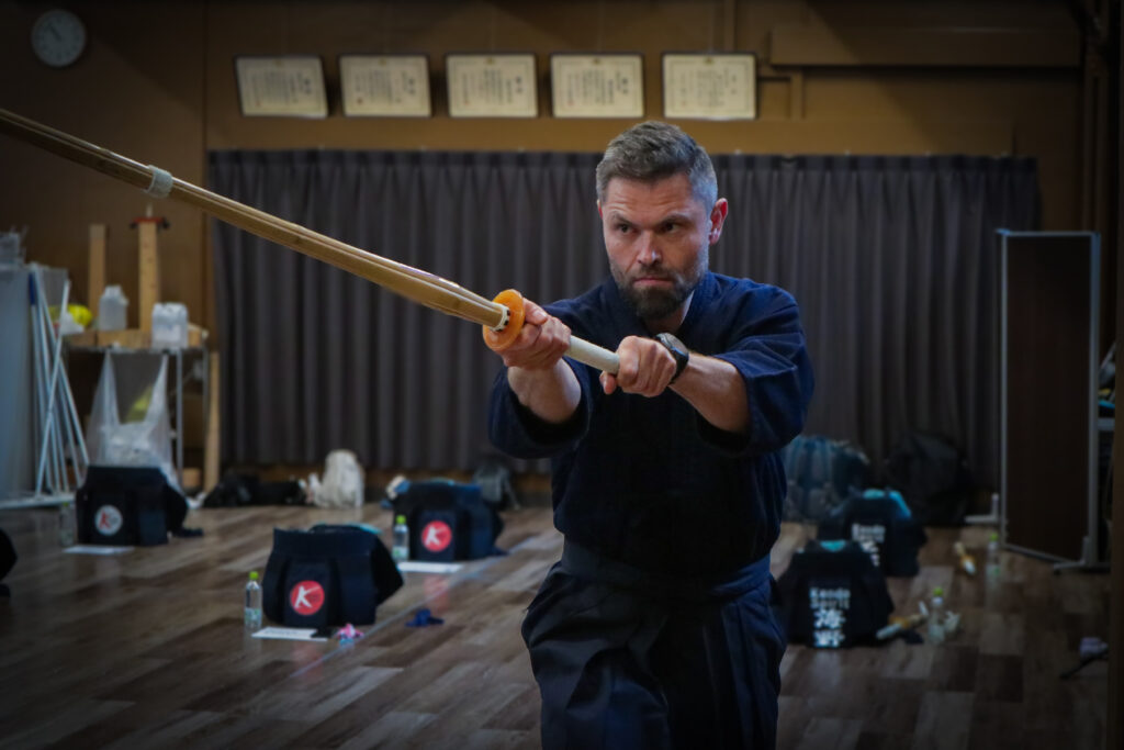 Beginner practicing kendo training in Tokyo dojo