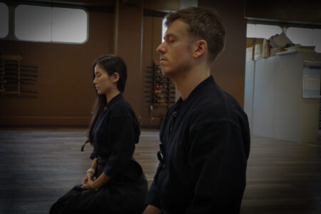 Learning proper kendo etiquette before practice in Tokyo dojo