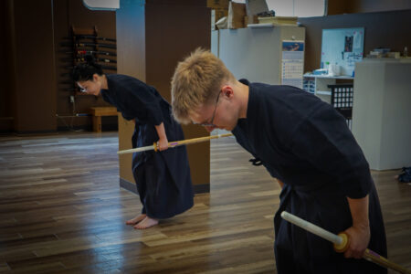 Participants practicing kendo bowing before training in Tokyo