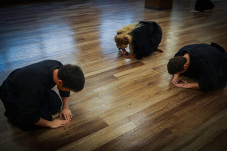 Beginners learning kendo bowing manners in Tokyo