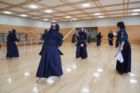 Group of participants practicing kendo together in Tokyo