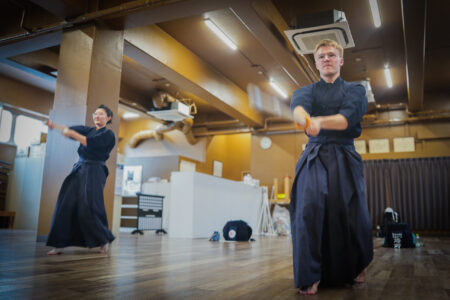 Kendo instruction for beginners in a Japanese dojo in Tokyo