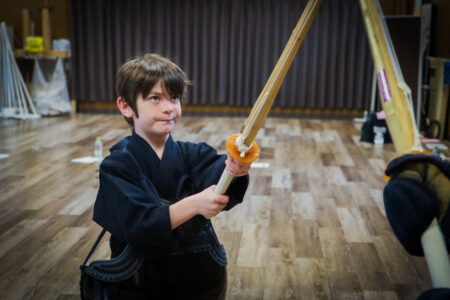 Practicing kendo techniques step by step in Tokyo dojo